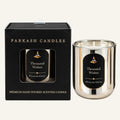 Parkash Candles 'Thousand Wishes' scented candle shown next to its black packaging box on a white background.